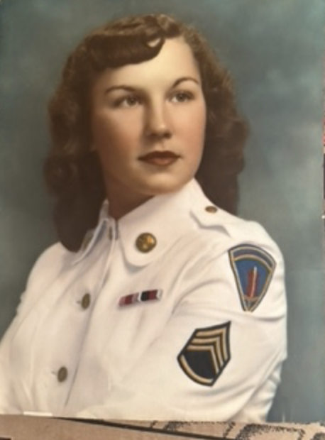 Dolores Katashuk in a white Army dress uniform, looking right.