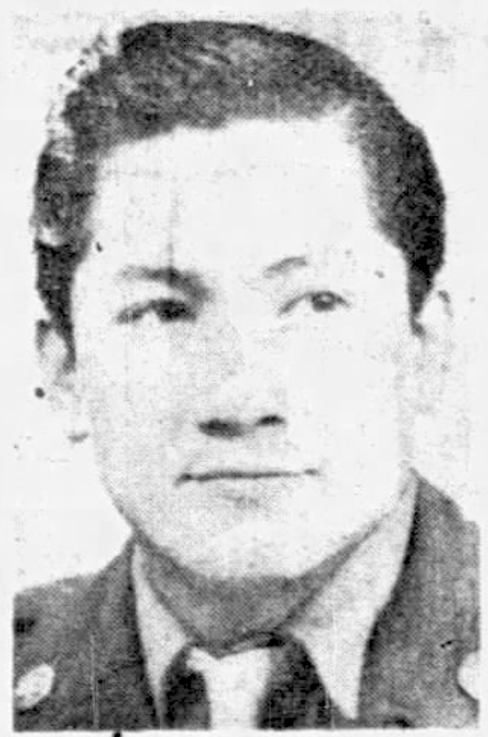 Photograph of a young, Japanese American man in military uniform, looking to the right.