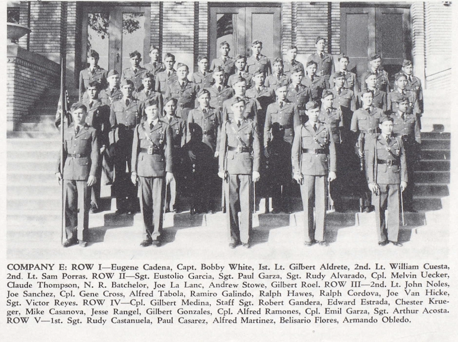 Group photo of San Antonio Vocational and Technical High School ROTC Company E. Flores is second from right in row five.