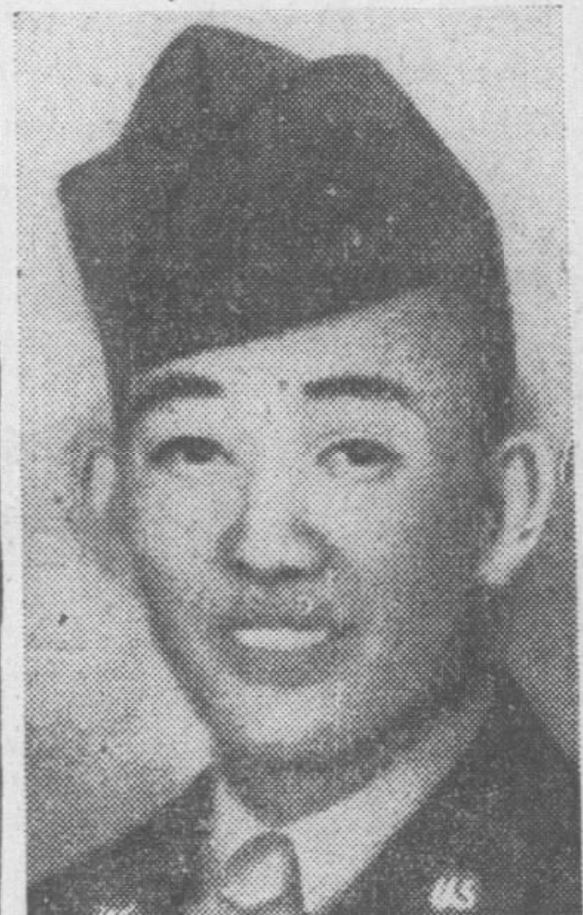 A young, Asian man in military dress uniform and hat, smiling at the camera.