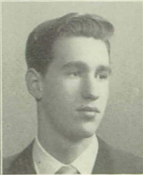 Cohen looking off to the side during his high school yearbook photo session.