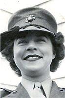 Profile picture of Joan March Davis saluting in military uniform.