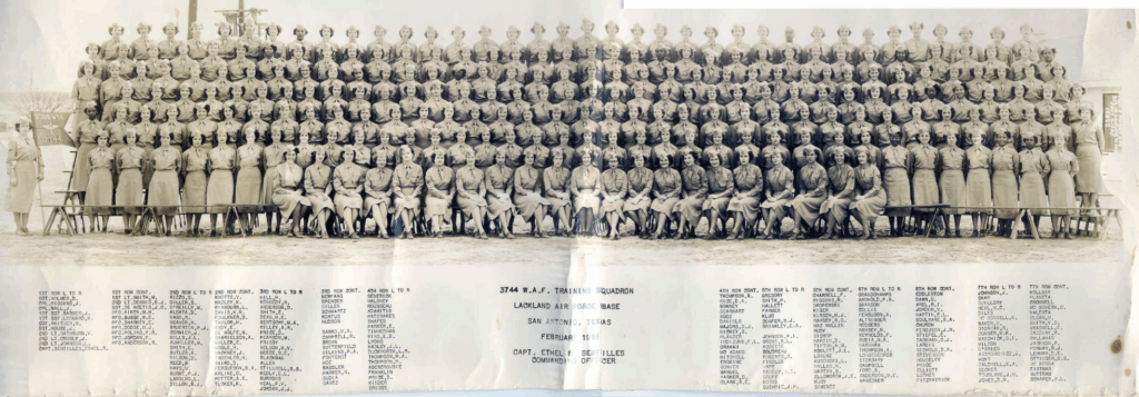 Group photo showing 7 rows of women in uniform.
