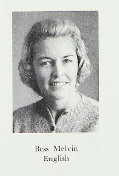 Taken from a high school yearbook. A headshot of a young woman with short hair and wearing a cardigan.