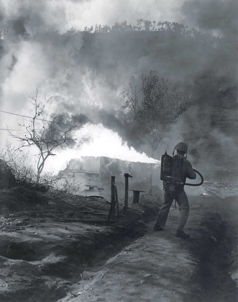 A U.S. Marine uses a flamethrower in combat.