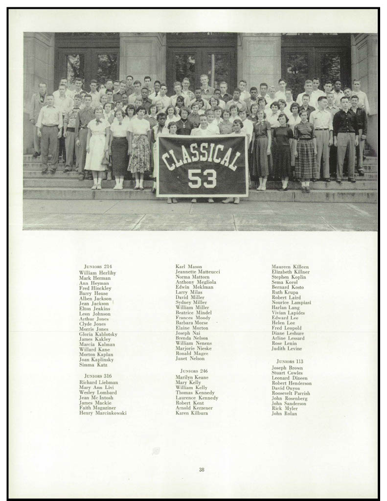 A full page of a yearbook. The top ⅓ of the page is a black and white image of dozens of students standing on the steps outside the school holding a banner that says ‘Classical 53.’ Underneath the picture is a list of the names of students by homeroom.