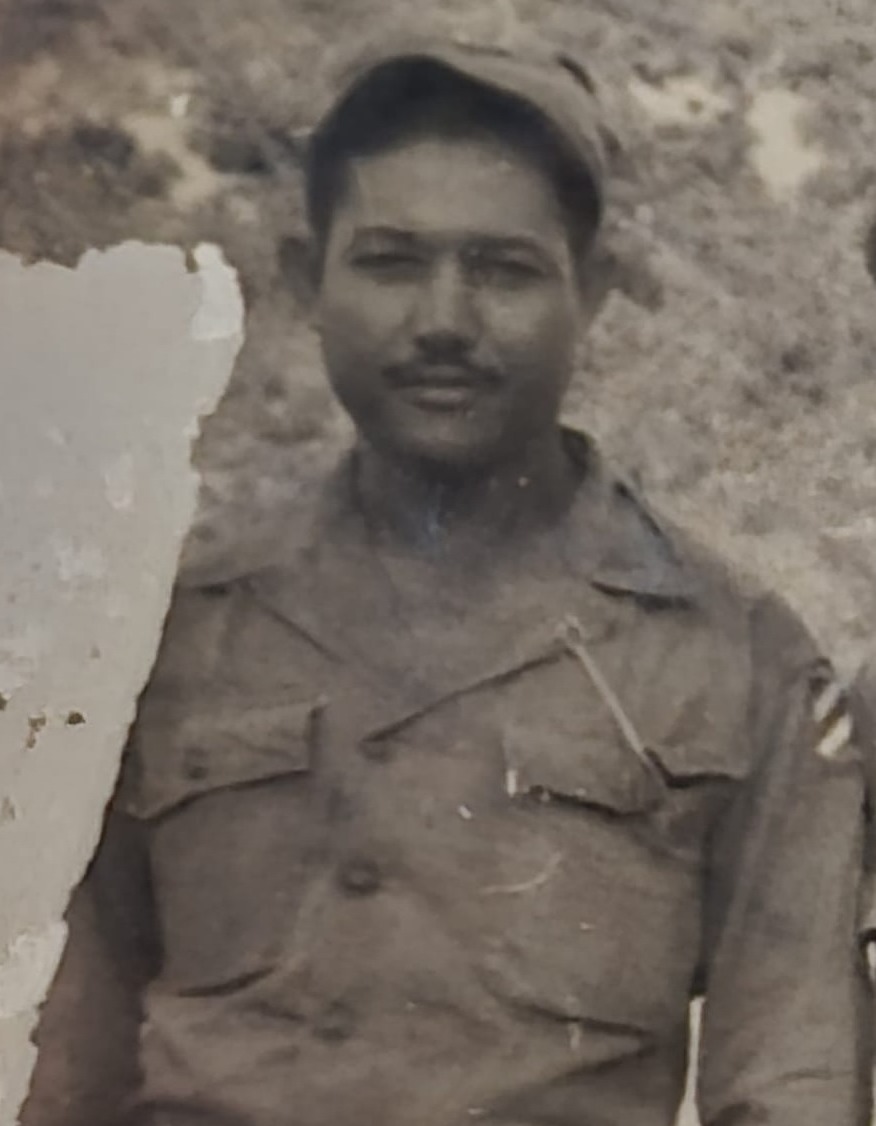 A young Puerto Rican man in an Army uniform.