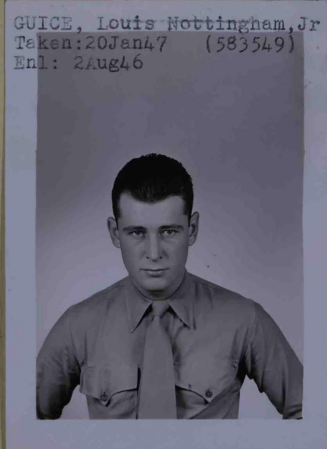 A black and white photograph of a young man from the chest up. He is wearing a button-down uniform shirt and tie. Information typewritten at the top of the image reads: “GUICE, Louis Nottingham, Jr. Taken: 20Jan47 (583549) Enl: 2Aug1946””