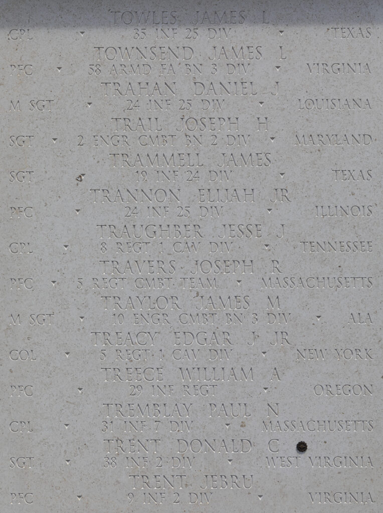 A photograph of names engraved on a wall. Tremblay is the third from the bottom. 