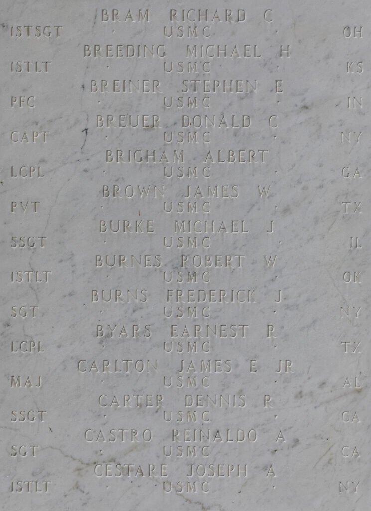 A photograph of the courts of the missing shows several names carved in white marble, included Brigham.