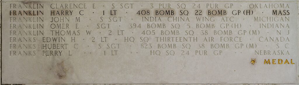 A photo of several names engraved in a wall, includsing Franklin’s. 