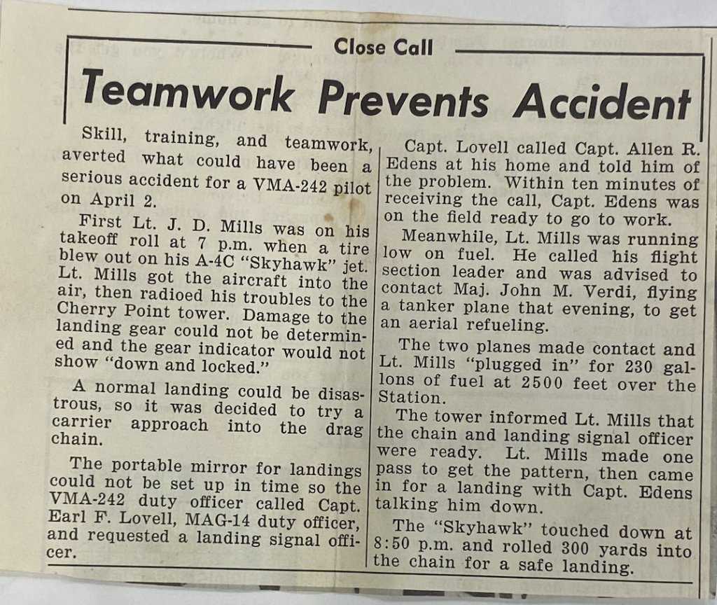 A newspaper article titled "Teamwork Prevents Accident."