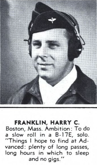 A black and white headshot of a White man in uniform with headphones on.