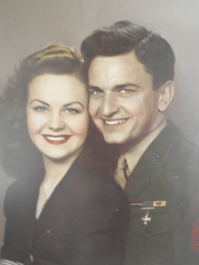 A young couple in a formal picture.