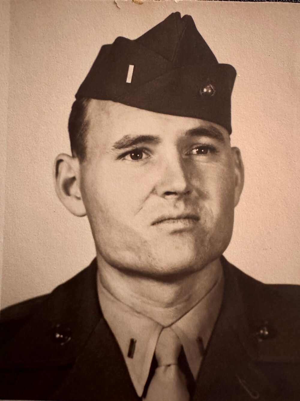 A young man in a Marine Corps uniform.