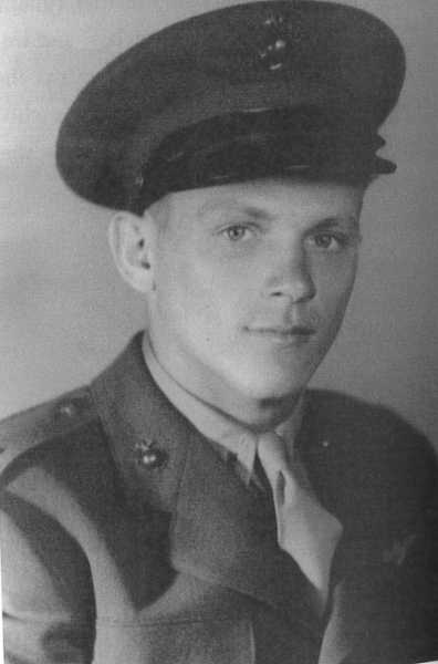 A black and white headshot of a White young man in uniform.