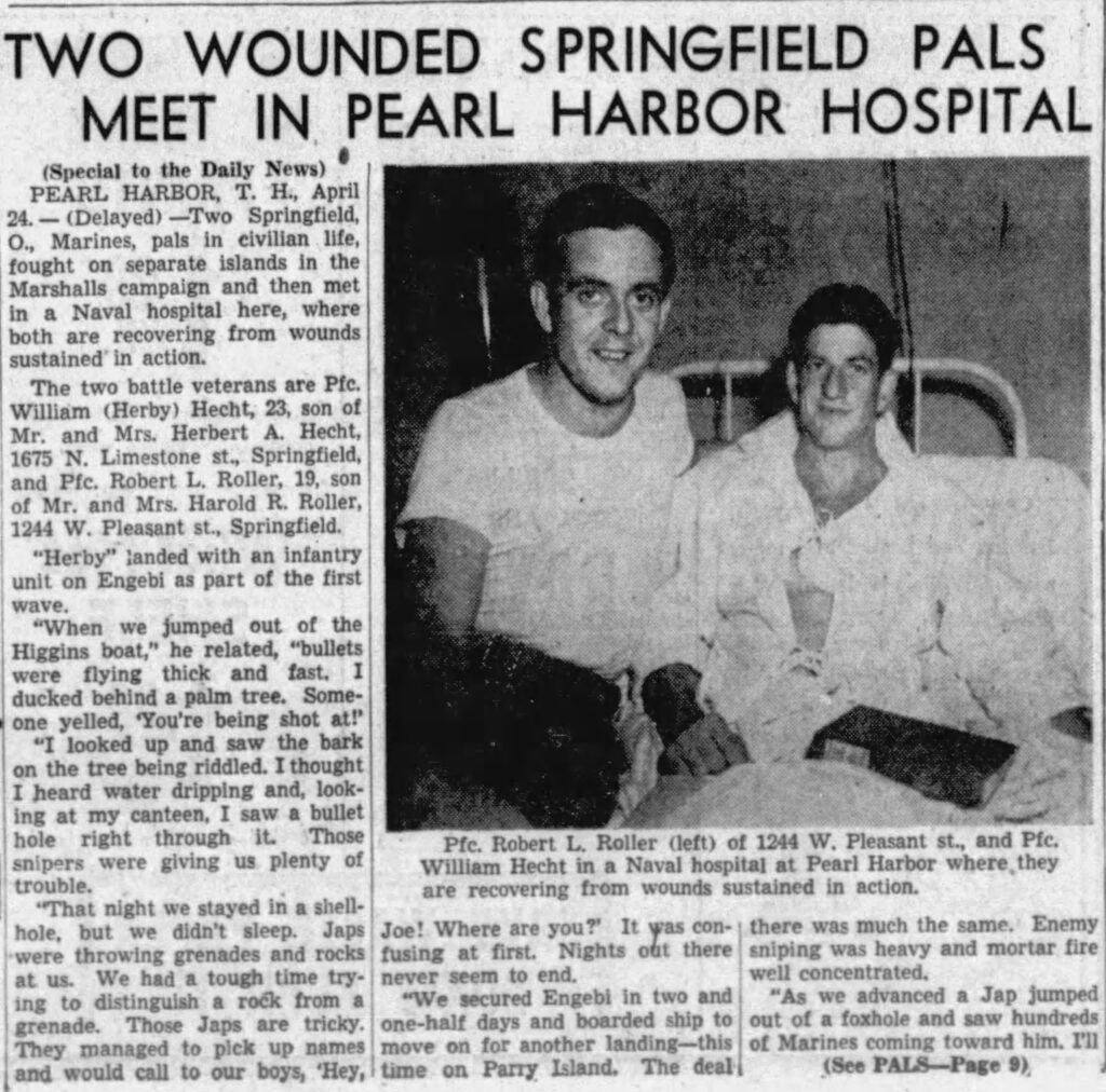 A newspaper article titled “Two Wounded Springfield Pals Meet in Pearl Harbor Hospital.” Nexto the article is an image of two White men. One is in a hospital bed and gown with a book in his lap. The other is sitting on the edge of the bed.