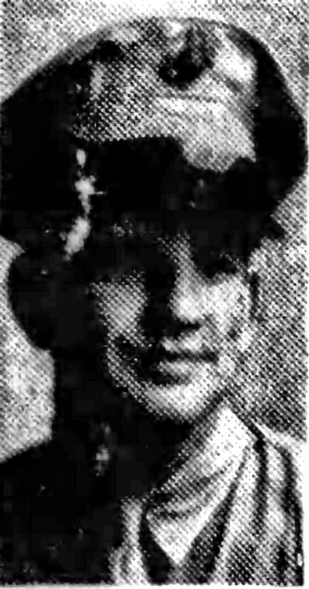A black and white headshot photo of a young White man in uniform.