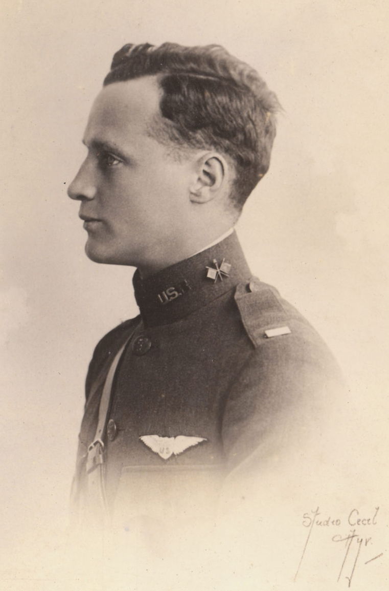 A profile picture of a young man in a Army uniform looking left.