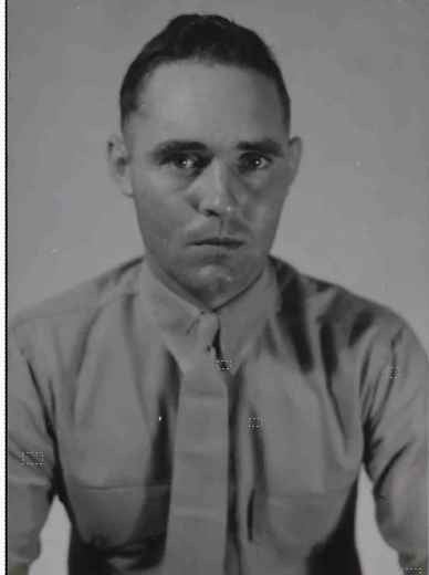 A young man in a Marine Corps uniform.