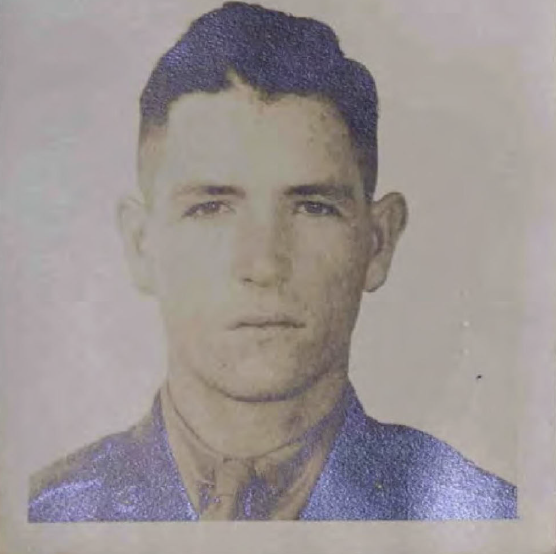A young man in a Marine Corps uniform.