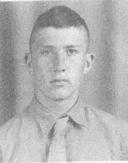 A young man in a Marine Corps uniform.