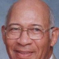 An African American man wearing glasses.
