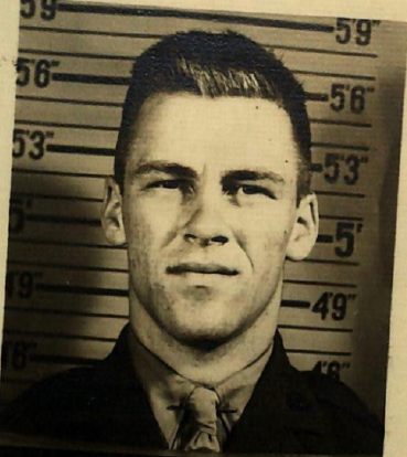 A young man in a Marine Corps uniform.