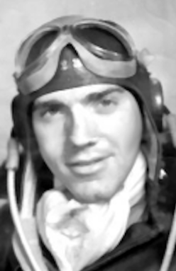 A young man in a flight helmet.