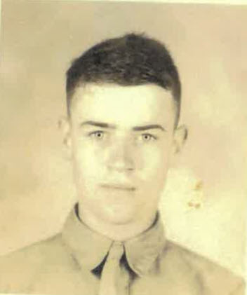 A young man in a Marine Corps uniform.