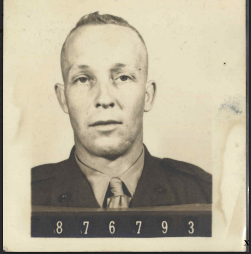 A sepia headshot image of a young White man in uniform.