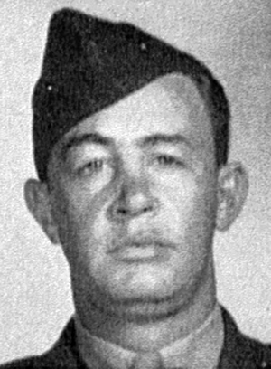 A young man in a Marine Corps uniform.