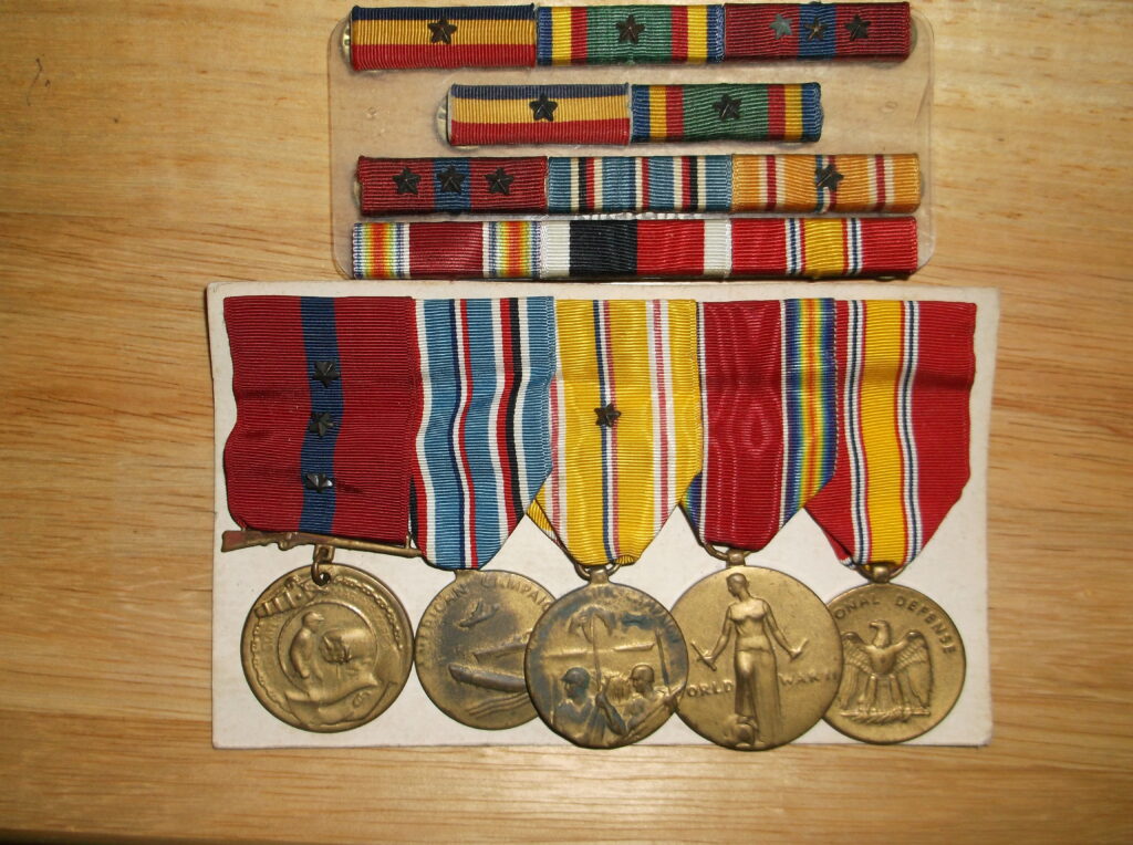 A color photo of several ribbons and medals.