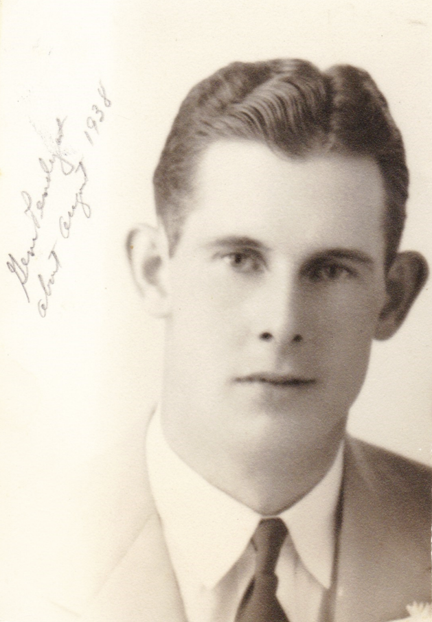 A young man in a jacket and tie.
