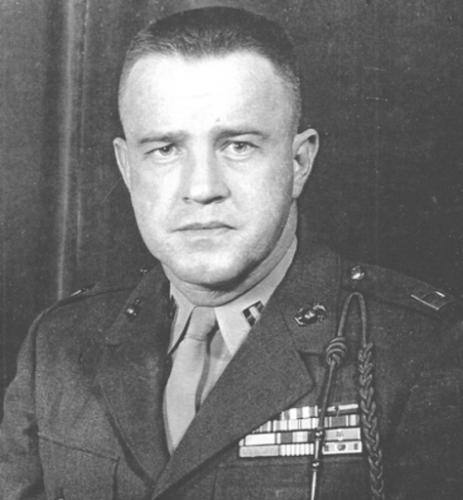 A black and white headshot of an older White man in uniform.