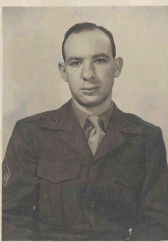 A young man in a Marine Corps uniform.