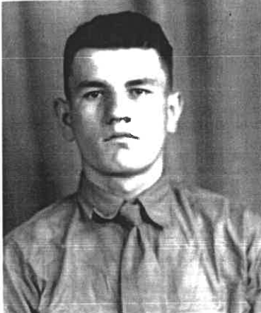 A black and white headshot image of a young White man in uniform.