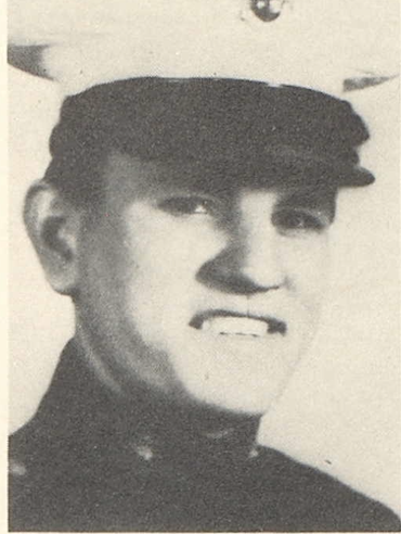 A black and white headshot image of a young White man in uniform.