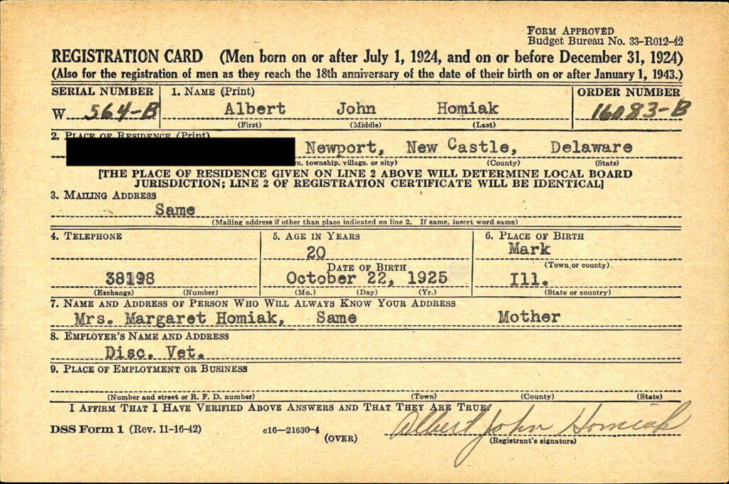 A handwritten card with information about Homiak.