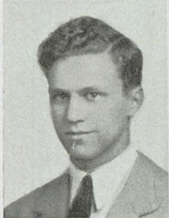 A black and white headshot of a young White man.