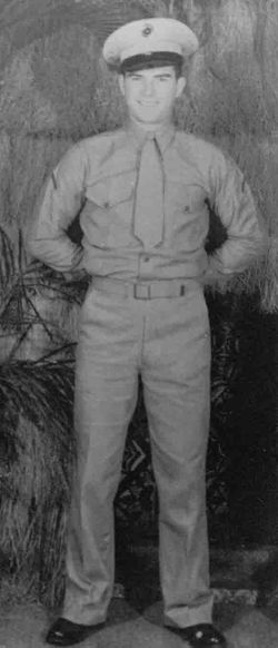 Russell McCurdy standing in uniform.