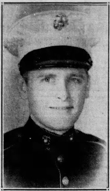 A young man in a Marine Corps uniform.