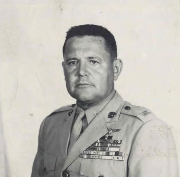 A black and white headshot of an older White man in uniform.
