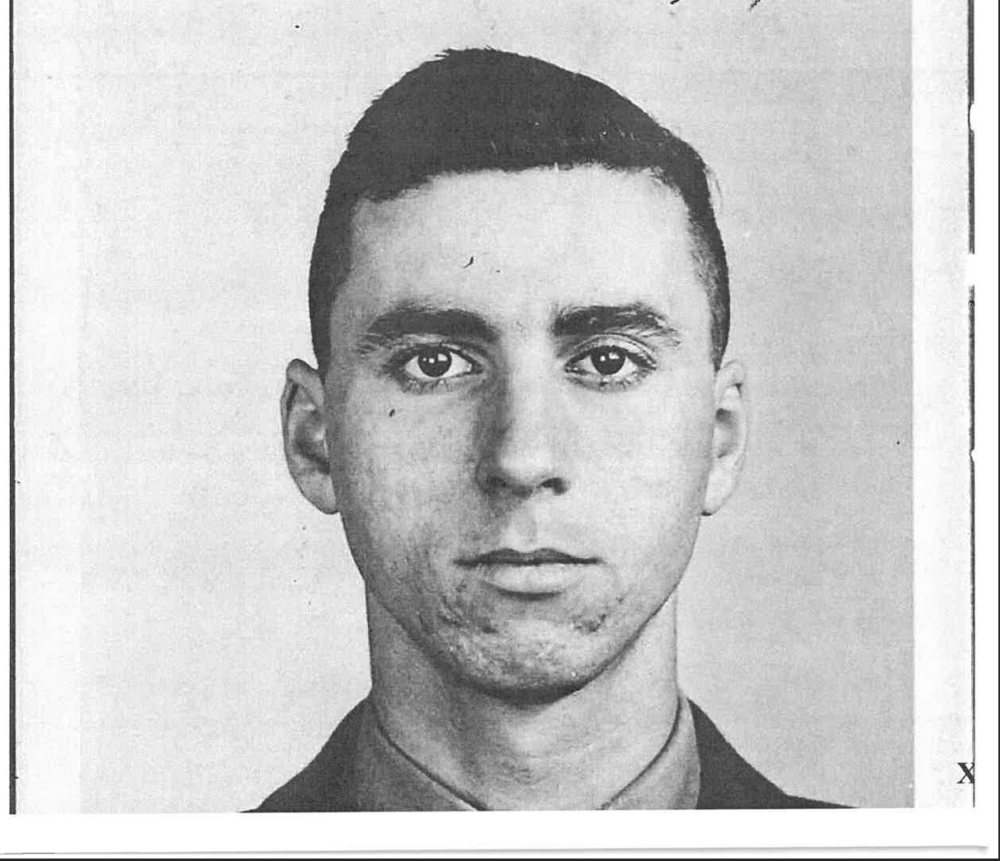 A young man in Marine Corps uniform.