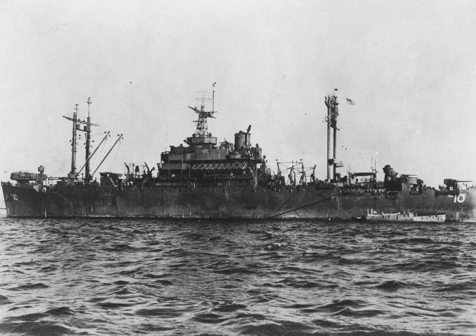 A black and white image of a large ship in the water.