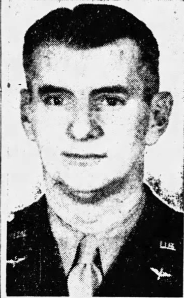 Black and white headshot photo of a young man in uniform.