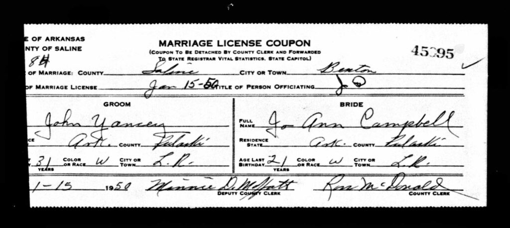 A handwritten slip with information about John and Jo Ann.