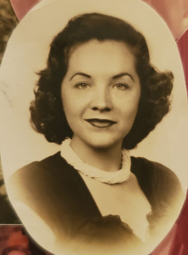 A black and white headshot of a young White woman.