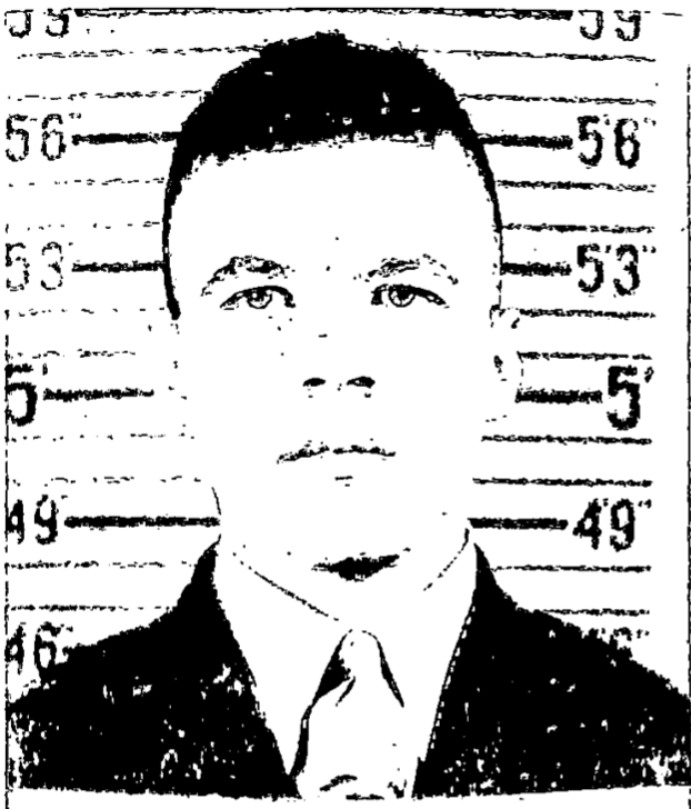 A black and white headshot of a young White man in uniform.