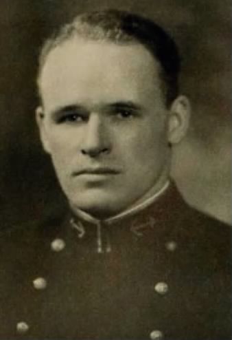 A young man in a Naval Academy uniform.